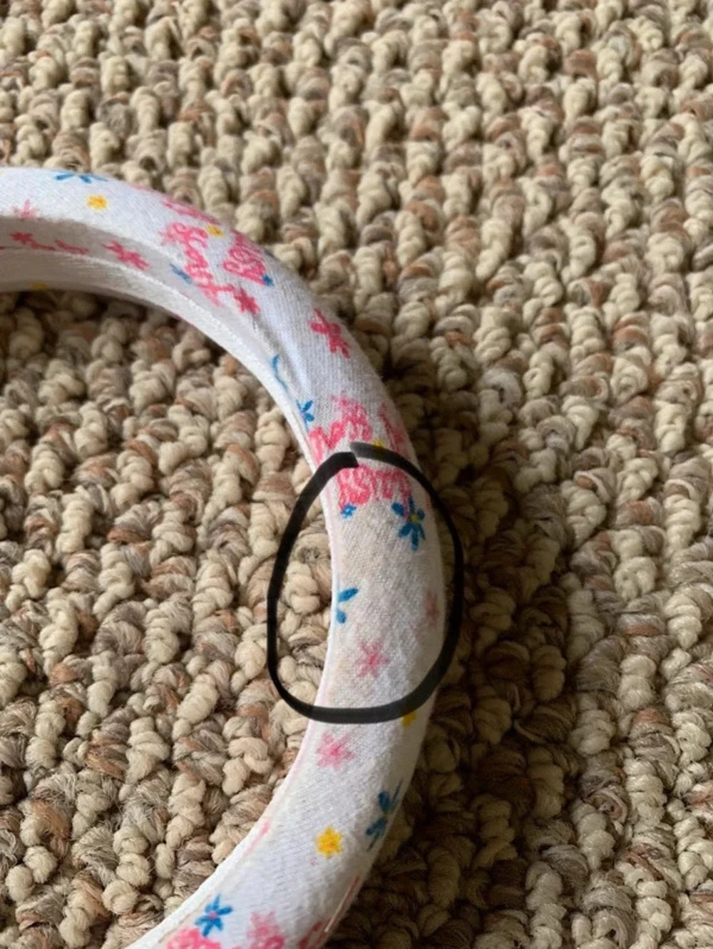 white and pink pattered headband